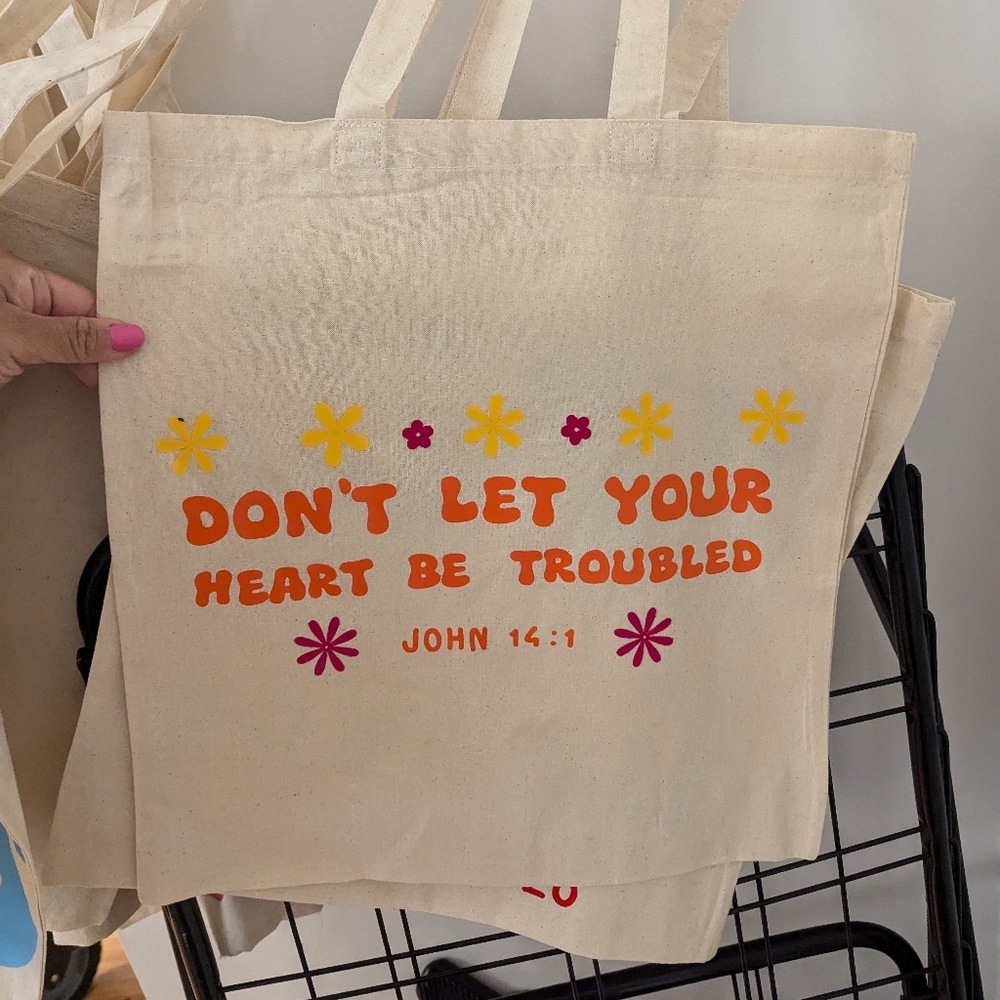 Don't let your heart be troubled tote bag